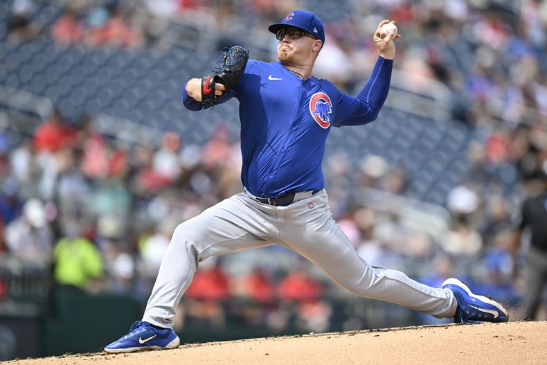 El abridor de los Cachorros de Chicago Jordan Wicks lanza en la primera entrada ante los Nacionales de Washington el domingo primero de septiembre del 2024. (AP Foto/John McDonnell)