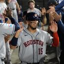 El mexicano Isaac Paredes, de los Astros de Houston, festeja en la caseta luego de anotar ante los Medias Blancas de Chiago, el viernes 24 de julio de 2026 (AP Foto/David Banks)