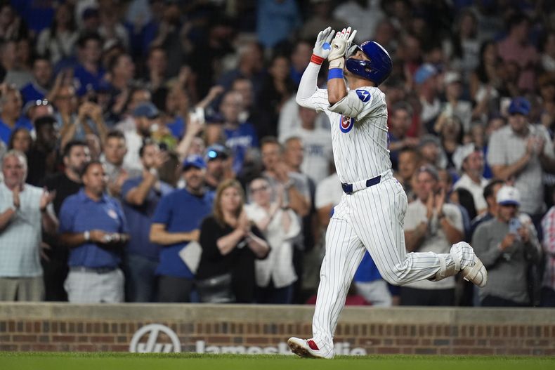 El japonés Seiya Suzuki, de los Cachorros de Chicago, recorre las bases luego de conseguir un jonrón ante los Nacionales de Washington, el jueves 19 de septiembre de 2024 (AP Foto/Erin Hooley)