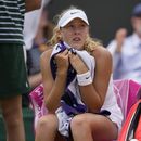 La rusa Mirra Andreeva sentada durante un tiempo muerto en el encuentro de la cuarta ronda ante Madison Keys en Wimbledon el lunes 10 de julio del 2023. (AP Foto/Alastair Grant)