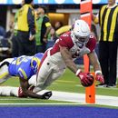 McCoy y Conner guían a Cardinals a vencer 27-17 a Rams