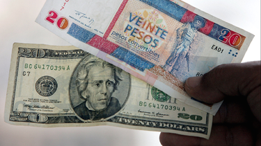 obama podria levantar la prohibicion al uso del dolar por cuba