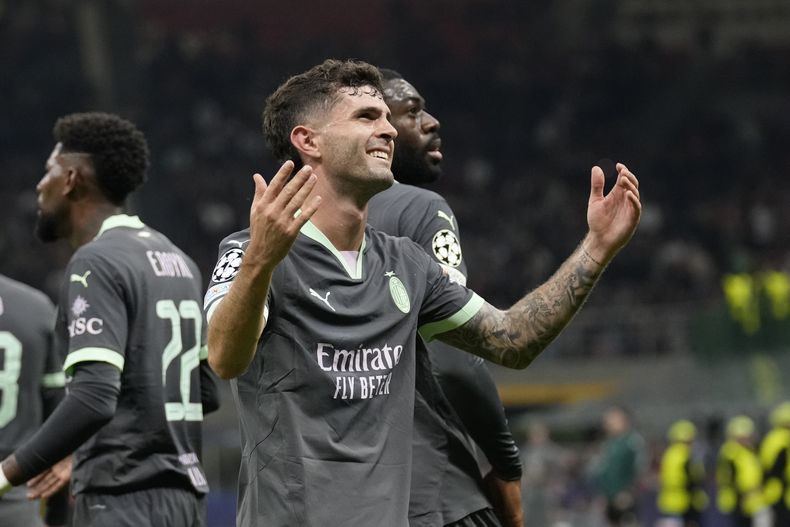 Christian Pulisic tras anotar un gol olímpico para el AC Milan ante Brujas en la Liga de Campeones, el martes 22 de octubre de 2024. (AP Foto/Antonio Calani)