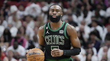 FILE - Boston Celtics guard Jaylen Brown (7) dribbles the ball during Game 3 of the NBA basketball playoffs Eastern Conference finals against the Miami Heat, Sunday, May 21, 2023, in Miami. Celtics wing Jaylen Brown has agreed to terms on a five-year supermax contract extension that will pay him up to $304 million, his agent said on Tuesday, July 25, 2023. (AP Photo/Wilfredo Lee, File)
