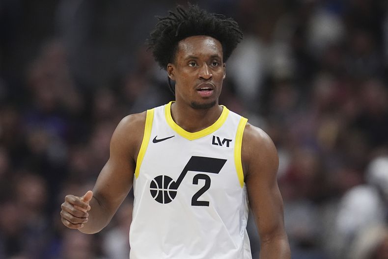 ARCHIVO - Collin Sexton (2), del Jazz de Utah, durante la primera mitad del juego de baloncesto de la NBA, el viernes 28 de marzo de 2025, en Denver. (AP Foto/David Zalubowski, Archivo)