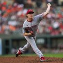 Andrew Abbott abridor de los Rojos de Cincinnati realiza un lanzamiento ante los Orioles de Baltimore en la segunda entrada del partido de béisbol en Baltimore, martes 27 de junio de 2023. (AP Foto/Julio Cortez)