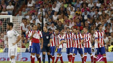 americateve | Los jugadores de Atl&eacute;tico de Madrid festejan un gol contra Real Madrid en la liga espa&ntilde;ola el s&aacute;bado, 13 de septiembre de 2014, en Madrid. (AP Photo/Daniel Ochoa de Olza)
