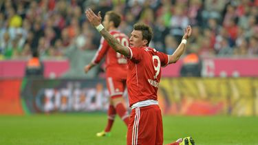 americateve | El jugador de Bayern Munich, Mario Mandzukic, gesticula en un partido contra Borussia Dortmund por la Bundesliga el s&aacute;bado, 12 de abril de 2014, en Munich, Alemania. (AP Photo/Kerstin Joensson)