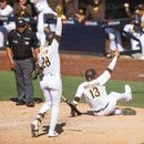 Machado anota en la 10ma; Padres superan a Rockies