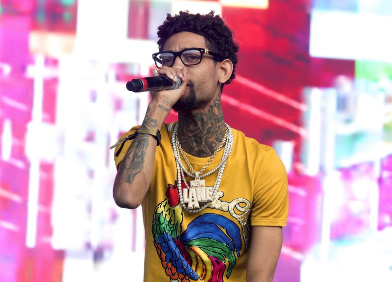 ARCHIVO - El rapero de Filadelfia PnB Rock se presenta en el Festival de Música Firefly 2018 en Dover, Delaware, el 16 de junio de 2018. (Foto Owen Sweeney/Invision/AP, archivo)