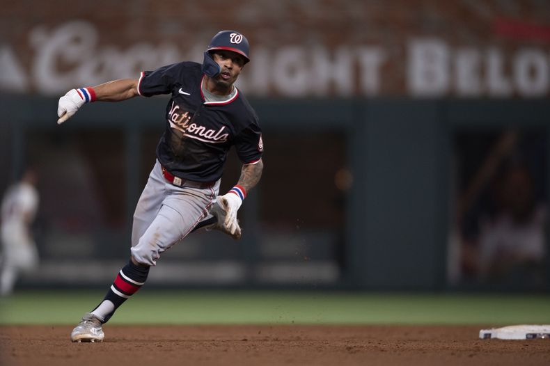 Nassim Núñez, de los Nacionales de Washington, corre para anotar en el juego del miércoles 14 de mayo de 2025 ante los Bravos de Atlanta (AP Foto/Kathryn Skeean)