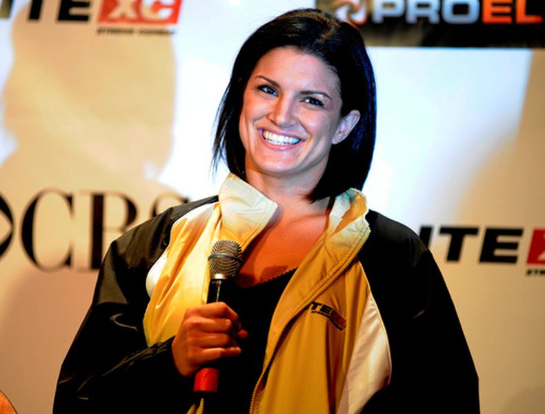ARCHIVO - Gina Carano, boxeadora de artes marciales, durante una rueda de prensa, el jueves 29 de mayo de 2008, en Nueva York. (AP Foto/ Louis Lanzano)
