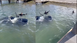 cubana de miami comienza a gritar mientras ve como su mercedes-benz se hunde frente a sus ojos en una rampa para botes
