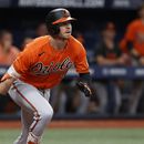 Ryan OHearn, de los Orioles de Baltimore, conecta un sencillo productor ante los Rays de Tampa Bay, el sábado 22 de julio de 2023 (AP Foto/Scott Audette)