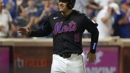 El cubano José Iglesias, de los Mets de Nueva York, festeja tras anotar ante los Nacionales de Washington, el miércoles 10 de julio de 2024 (AP Foto/Pamela Smith)