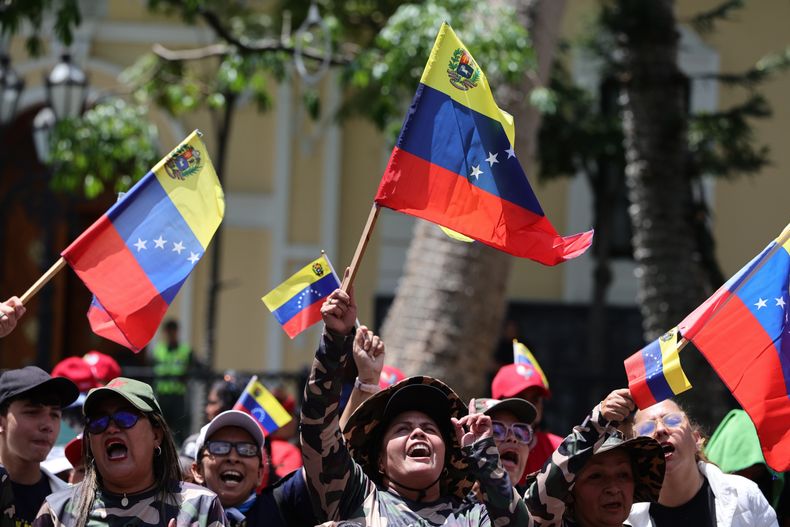 Miembros de las milicias bolivarianas se reúnen para ejercicios militares, el sábado 4 de octubre de 2025, en Caracas. (AP Foto/Jesús Vargas)