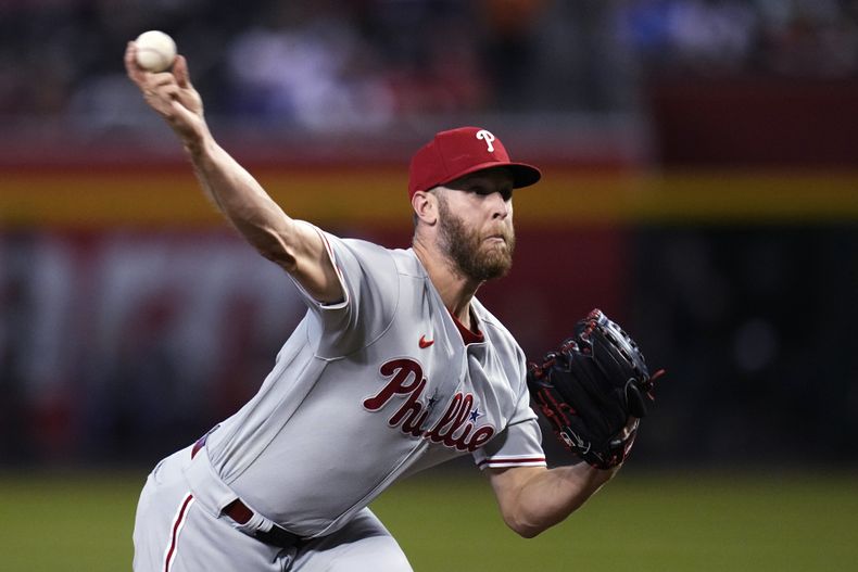 Zack Wheeler, de los Filis de Filadelfia, cumple con su apertura ante los Diamondbacks de Arizona, el martes 13 de junio de 2023 (AP Foto/Ross D. Franklin)