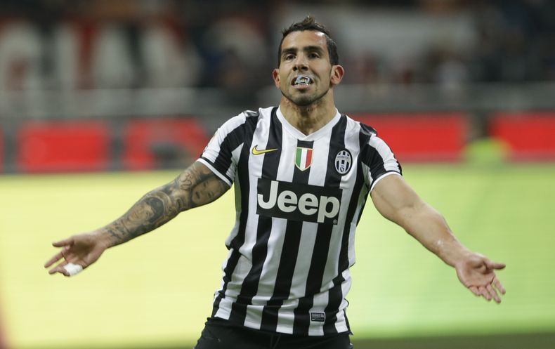 Carlos Tevez festeja el gol que anot&oacute; en la victoria 2-0 de Juventus sobre Milan el 2 de marzo del 2014 en Mil&aacute;n. El delantero dice que su convocatoria o no a la selecci&oacute;n argentina que jugar&aacute; la Copa Mundial depende del t&eacu