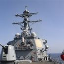 En esta fotografía proporcionada por la Marina de Estados Unidos, el buque de guerra USS Milius realiza un tránsito de rutina por el Estrecho de Taiwán, el domingo 16 de abril de 2023. (Marina de EEUU vía AP)