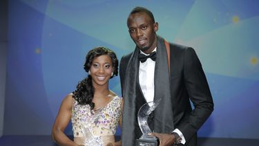 americateve | El velocista jamaiquino Usain Bolt, derecha, y su compatriota Shelly-Ann Fraser-Pryce posan tras recibir los premios a los atletas del a&ntilde;o el s&aacute;bado, 16 de noviembre de 2013, en M&oacute;naco. (AP Photo/Lionel Cironneau)