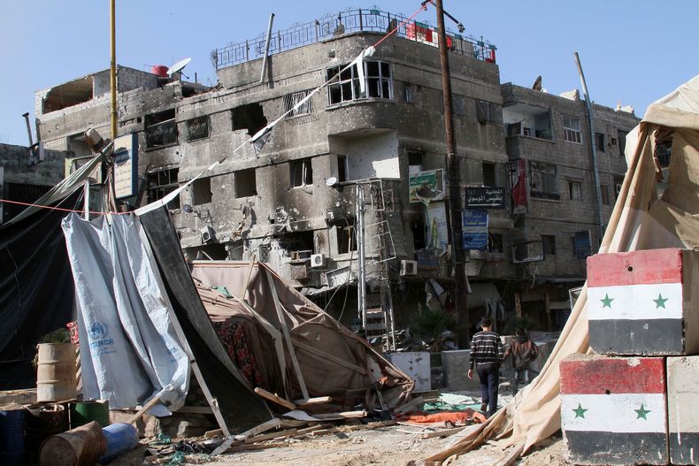 Da&ntilde;os ocasionados por la guerra en el pueblo de Hejeira, Siria, que fue capturado por las tropas del gobierno el mi&eacute;rcoles 13 de noviembre de 2013. (Foto AP)