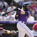 Rockies ganan a Cardenales con jonrones de Rodgers y McMahon