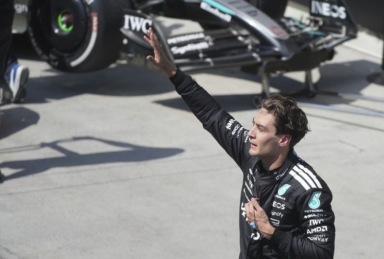 El piloto de Mercedes, George Russell, del Reino Unido, celebra después de ganar el Gran Premio de Canadá de F1 en Montreal, el domingo 15 de junio de 2025. (Christinne Muschi/The Canadian Press vía AP)