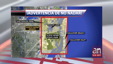 aviso de precaucion en playa de miami por derrame de aguas residuales
