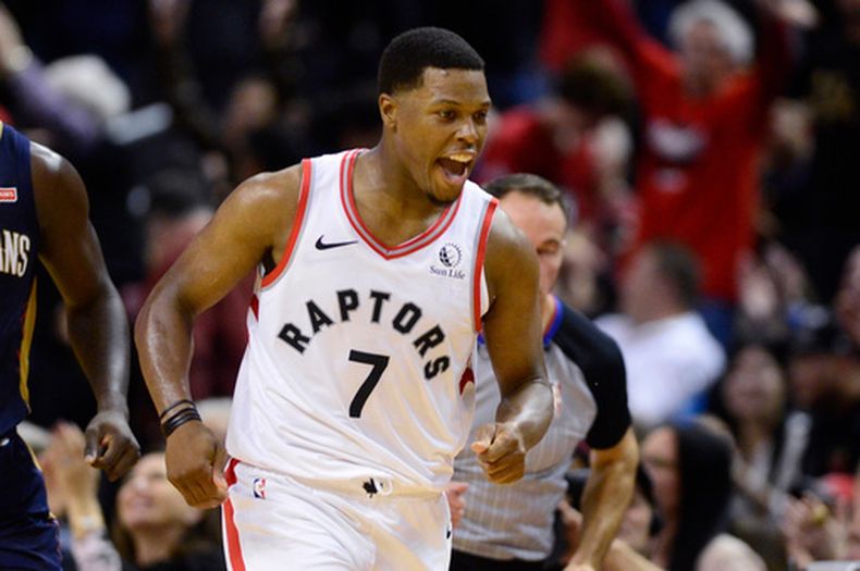 ARCHIVO - Foto del 22 de octubre del 2019, el base de los Raptors de Toronto Kyle Lowry celebra su triple en el tiempo extra ante los Pelicans de Nueva Orleans. (Frank Gunn/The Canadian Press via AP, Archivo)