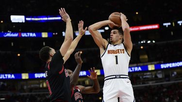 Porter anota 31 puntos y Nuggets doblegan 126-103 a Bulls