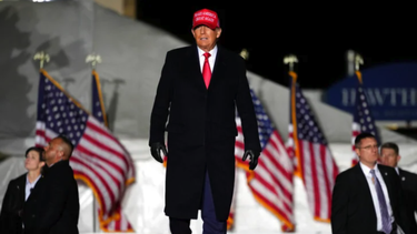 Former President Donald Trump arrives at a rally in Sioux City, Iowa, November 3 [Charlie Neibergall/AP Photo]