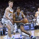 Con ayuda de Monk, los Kings superan 127-126 a Nuggets