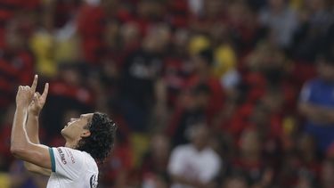 americateve | Carlos Pe&ntilde;a del Le&oacute;n de M&eacute;xico celebra tras anotar un gol ante Flamengo de Brasil en la Copa Libertadores el mi&eacute;rcoles 9 de abril de 2014. (AP Foto/Felipe Dana)