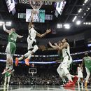 Giannis y Holiday comandan triunfo de Bucks sobre Celtics