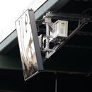 ARCHIVO - En foto del 10 de julio del 2019 un radar montado en el techo sobre el plato en el PeoplesPark Bank en el encuentro de ligas menores. (AP Foto/Julio Cortez, Archivo)