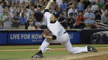 americateve | En la imagen, el lanzador de los Yanquis de Nueva York Masahiro Tanaka en su partido contra los Medias Rojas de Boston, el 28 de junio de 2014.  (AP Photo/Julie Jacobson)