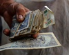 ¿A qué se debe la caída del valor del dólar y el MLC en Cuba?