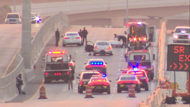 detienen a 2 hombres en un automovil robado en el dolphin expressway