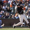 Flores logra grand slam; Gigantes derrotan a Cardenales