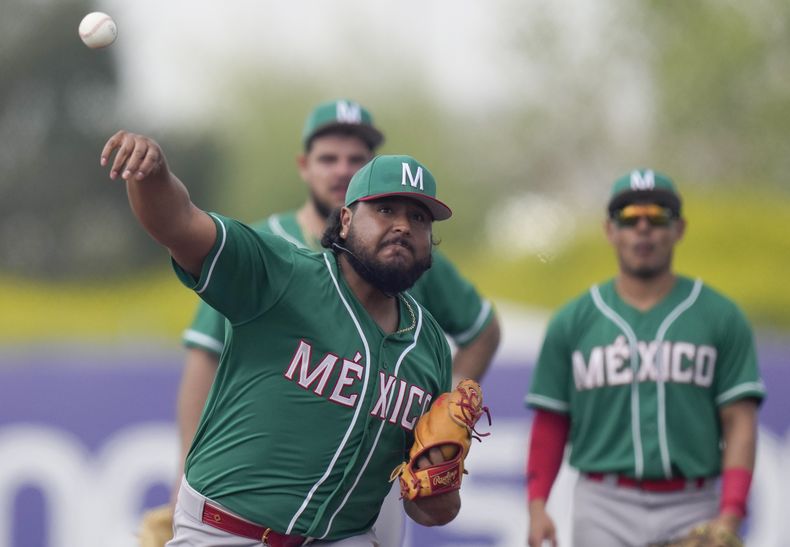 La selección mexicana de béisbol enfrenta a Chile durante los Juegos Panamericanos en Santiago, el miércoles 18 de octubre de 2023 (AP foto/Silvia Izquierdo)