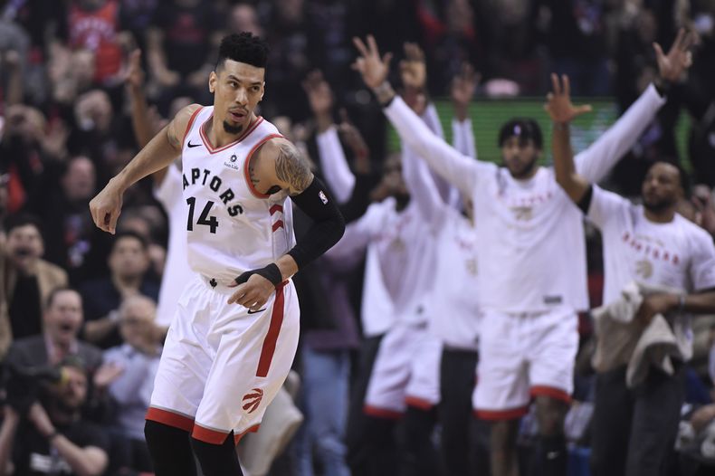 ARCHIVO - El escolta de los Raptors de Toronto, Danny Green (14), reacciona después de anotar un triple contra los Warriors de Golden State durante la primera mitad del Juego 1 de las Finales de la NBA, el 30 de mayo de 2019, en Toronto. (Frank Gunn/The Canadian Press vía AP, Archivo)