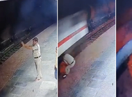 india: policia salva a una anciana justo antes de que un tren pase a toda velocidad + video