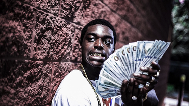 video: el rapero kodak black arroja al mar miles de dolares en billetes de 100 frente en la bahia de miami