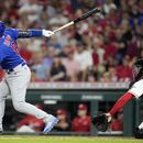 Happ lidera festival de jonrones; Cachorros vencen a Rojos
