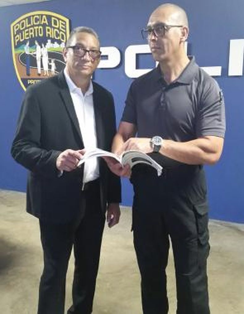 En la reunión de ayer estuvieron el teniente coronel José Rosario Polanco (izq.) y coronel Francisco Rodríguez. 
