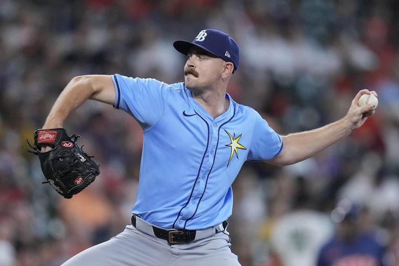 Tyler Alexander, relevista de los Rays de Tampa Bay, trabaja durante la segunda entrada del juego de béisbol en contra de los Astros de Houston, el domingo 4 de agosto de 2024, en Houston. (AP Foto/Kevin M. Cox)