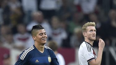 americateve | El jugador de la selecci&oacute;n de Argentina y Manchester United, Marcos Rojo, izquierda, durante un amistoso contra Alemania el mi&eacute;rcoles, 3 de septiembre de 2014, en Duesseldorf, Alemania. (AP Photo/Martin Meissner)