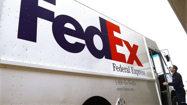 Un camión de Federal Express en Springfield, Illinois el 18 de diciembre del 2014. (AP foto/Seth Perlman)