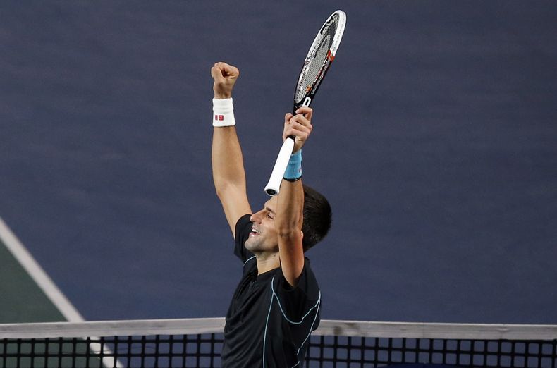 El serbio Novak Djokovic festeja tras vencer a David Ferrer en la final del Masters de Par&iacute;s el domingo, 3 de noviembre de 2013, en Par&iacute;s. (AP Photo/Francois Mori)
