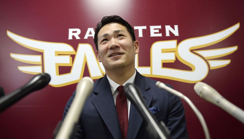 El pitcher japon&eacute;s Masahiro Tanaka habla en una conferencia de prensa el martes, 17 de diciembre de 2013, en Sendai, Jap&oacute;n. (AP Photo/Kyodo News) JAPAN OUT, MANDATORY CREDIT